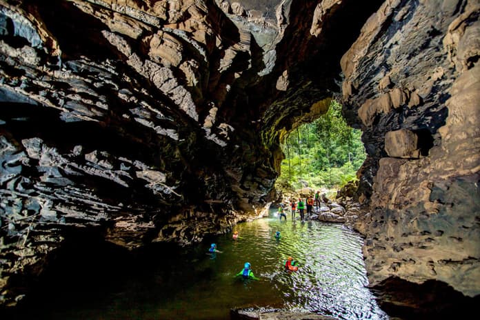 Swim towards Hung Ton Cave entrance.