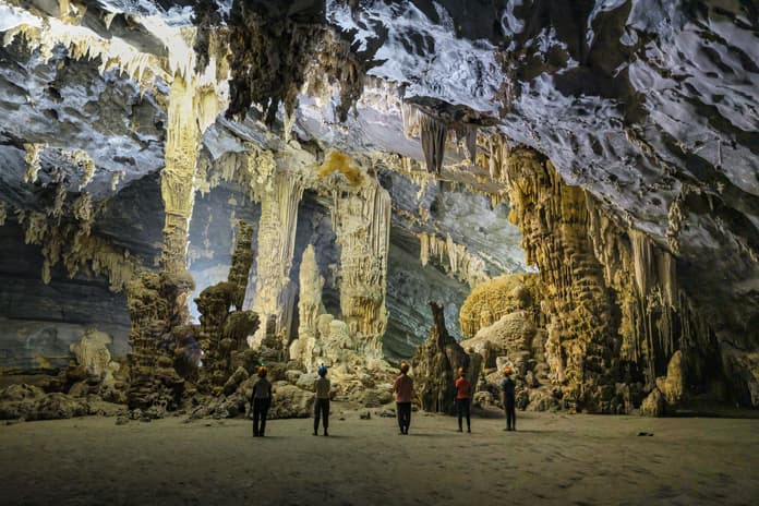 Tu Lan Cave has massive stalactite columns that look like a magnificent palace.