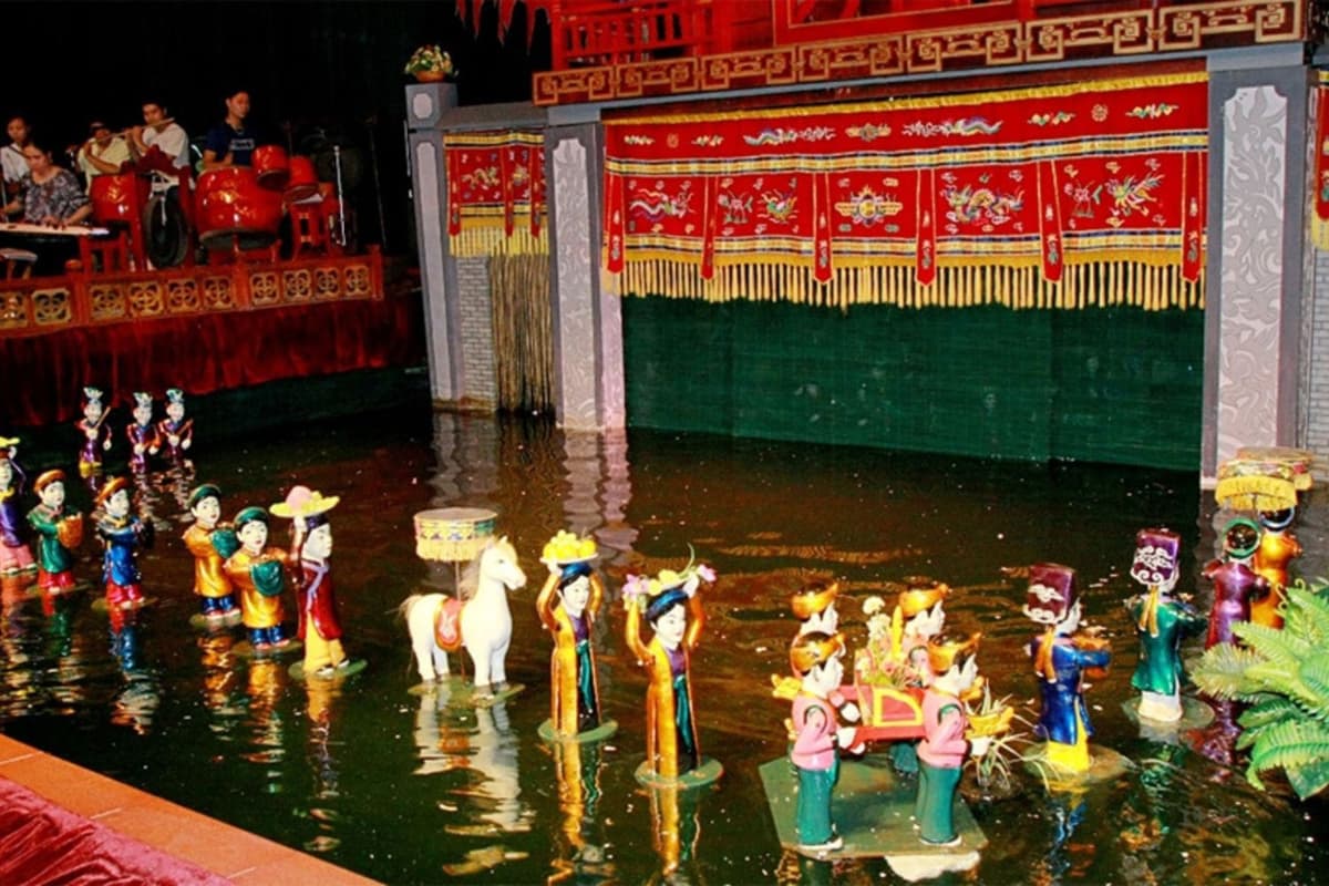Water puppetry depicts Vietnamese folklore and historical tales accompanied by live music.